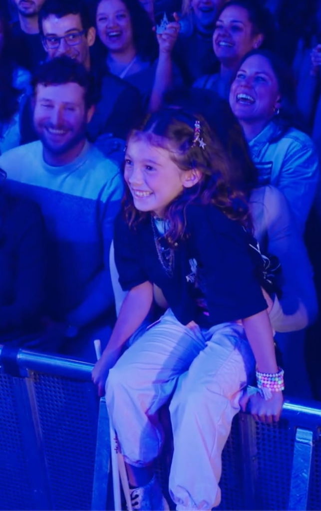 Excited girl at concert
